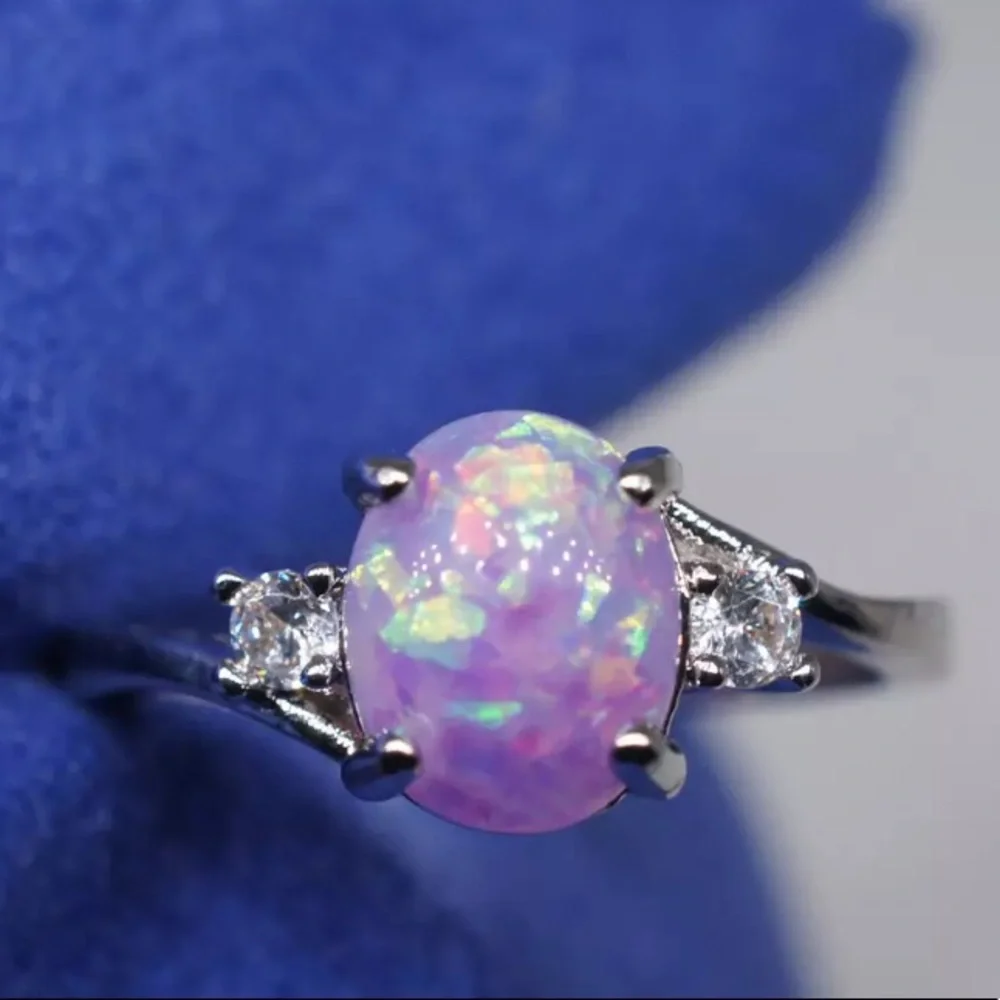 BRAND NEW.925SS OVAL CUT PINK OPAL RING